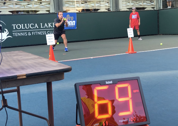 Ron Sarchian World Record Most Tennis Balls Caught in One Minute